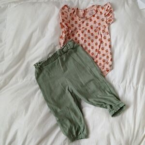 Carters 2 piece set floral top and green pants. Size 12 months.